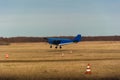Takeoff of a small amateur aircraft from a civil airfield. Royalty Free Stock Photo