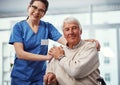 She takes great care of me. Cropped portrait of a young female nurse and her senior patient in the old age home. Royalty Free Stock Photo