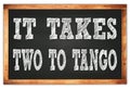 IT TAKES TWO TO TANGO words on black wooden frame school blackboard