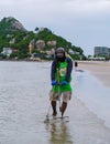 Takiab Beach Huahin Thailand, Fishermen fishing for shells on the beach