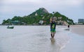 Takiab Beach Huahin Thailand, Fishermen fishing for shells on the beach