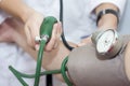 taking an arterial blood pressure