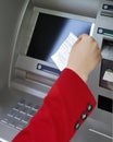 Taking ATM deposit slip Royalty Free Stock Photo