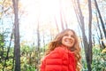 Taking in the beauty of autumn. an attractive young woman in the forest during autumn. Royalty Free Stock Photo