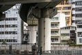 Taking a break, Osaka streets and aerial train tracks during a hot summer day, Central Osaka, Nakanoshima Island, Japan, Royalty Free Stock Photo