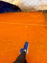 Taking a break from a tennis match. Clay tennis court Royalty Free Stock Photo