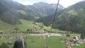 Taking cable car up to Isskogel mountain peak at village Gerlos in Tirol Austria