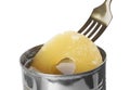 Taking canned pineapple ring from tin with fork on background, closeup Royalty Free Stock Photo