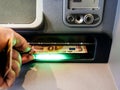 Taking cash from ATM Royalty Free Stock Photo