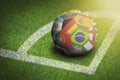 Taking corner with world flags soccer ball Royalty Free Stock Photo