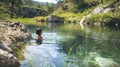 Taking a dip in a natural hot spring followed by a plunge into a cold lake to promote detoxification and rejuvenation.