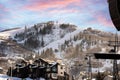 Taking the gondola to the top of the mountain in order to ski back down at a typical ski resort in the Colorado Mountains.