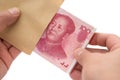 Taking out stack of RMB paper currency from envelope with clipping path Royalty Free Stock Photo