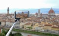 Taking photos with smart phone and selfie stick in Florence in I Royalty Free Stock Photo