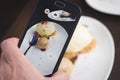 Taking picture of food with phone Royalty Free Stock Photo