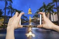 Taking picture of The Old Clock Tower in Hong Kong with smartphone Royalty Free Stock Photo