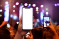 Taking pictures of music concert with smart phone from audience Royalty Free Stock Photo