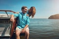 Taking romance out to sea. a young couple spending time together on a yacht. Royalty Free Stock Photo