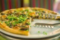 Slices of pizza. Table with pizza in a restaurant. Pizza close up on a green