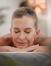 taking some time to collect her thoughts. a mature woman resting in between spa treatments. Royalty Free Stock Photo