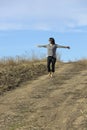 Taking a stroll barefooted on a dirt path Royalty Free Stock Photo