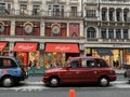 Iconic London taxi on the streets of England capital city Royalty Free Stock Photo