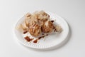 Takoyaki Chinese octopus meatballs closeup on a white table