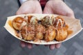 Takoyaki on hand women