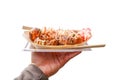 Takoyaki, Local Japanese octopus meat ball in the hand with Clipping Path