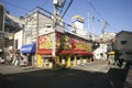 Takoyaki Restaurant in Dontonbori district with tourists. Royalty Free Stock Photo