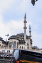 Taksim Mosque in Istanbul, Turkey and a Black Taxi in front