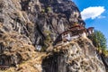 Taktshang Goemba, Taktsang Palphug Monastery or Tiger`s Nest Monastery, the most famous Monastery in Bhutan, in a mountain cliff Royalty Free Stock Photo