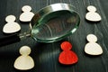Talent acquisition. Magnifying glass and figures as symbol an employee