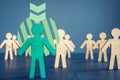 Talent acquisition and recruitment concept. Green figurine in the crowd. Royalty Free Stock Photo