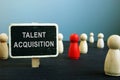 Talent acquisition strategies sign and figurines. HR management concept