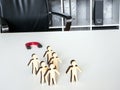 Talent employee Retention and Retaining. An office desk with magnet and figures.