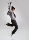 Talent, hip hop and young boy dancer dancing isolated in a white studio background in a pose feeling excited. African Royalty Free Stock Photo