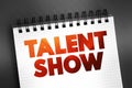 Talent show - event in which participants perform the activities to showcase skills, text on notepad concept background Royalty Free Stock Photo