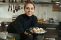 Talented chef has prepared lush cheesecakes, food is decorated berries