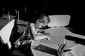 Talented child draws and paints pictures black and white