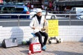 Talented Japanese street performer busking at the traffic lights