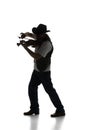 Talented man, silhouette of man playing violin isolated over white background. Black and white image. Royalty Free Stock Photo