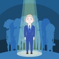 Talented Man In Spotlight Over Silhouette People Background Royalty Free Stock Photo