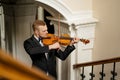 Talented professional violinist play in the hall Royalty Free Stock Photo