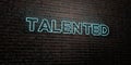 TALENTED -Realistic Neon Sign on Brick Wall background - 3D rendered royalty free stock image