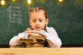 Talented schoolkid is doing his art homework in classroom at school. Kids really need is teacher who can meet them at