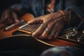 Talented unrecognizable male artist African-American musician close up male hands playing guitar fingers touching Royalty Free Stock Photo