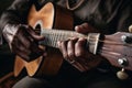 Talented unrecognizable male artist African-American musician close up male hands playing guitar fingers touching