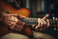 Talented unrecognizable male artist Caucasian musician teacher close up male hands playing guitar fingers touching Royalty Free Stock Photo