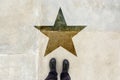 Talented young person on the road with star shape imprint